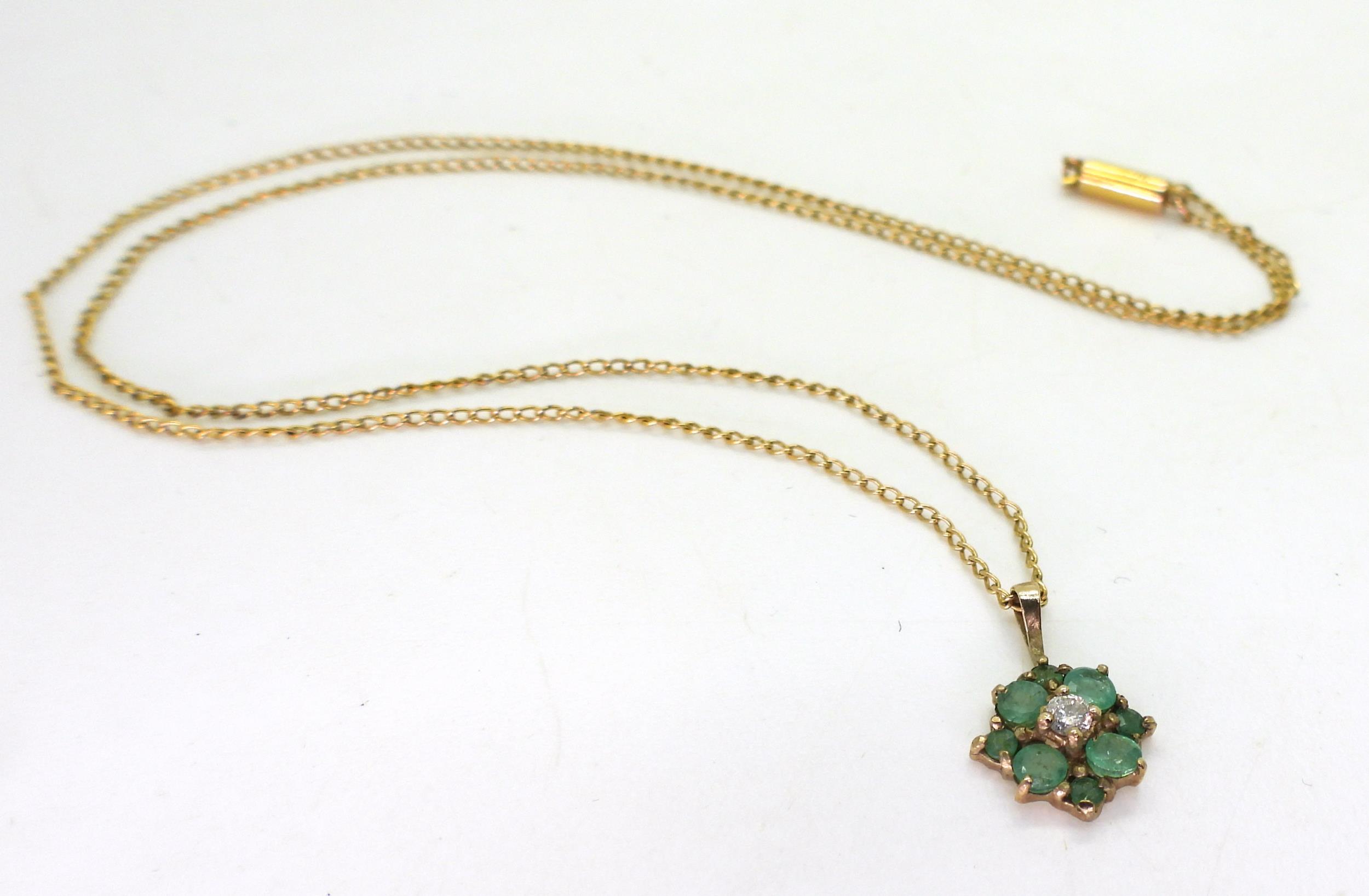 A yellow metal emerald and diamond flower pendant on a 9ct gold Ciro fine curb chain, length 40cm, - Image 4 of 8