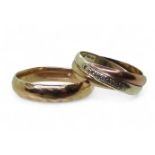 A 9ct gold court wedding ring, size Y1/2, and a 9ct gold three colour gold Russian wedding ring
