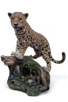 A large Country Artists Limited Edition Leopard, Spirit of Grace, modelled standing on a log, no
