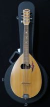 A contemporary mandola in natural finish, 18 frets with a fitted case Condition Report:Available