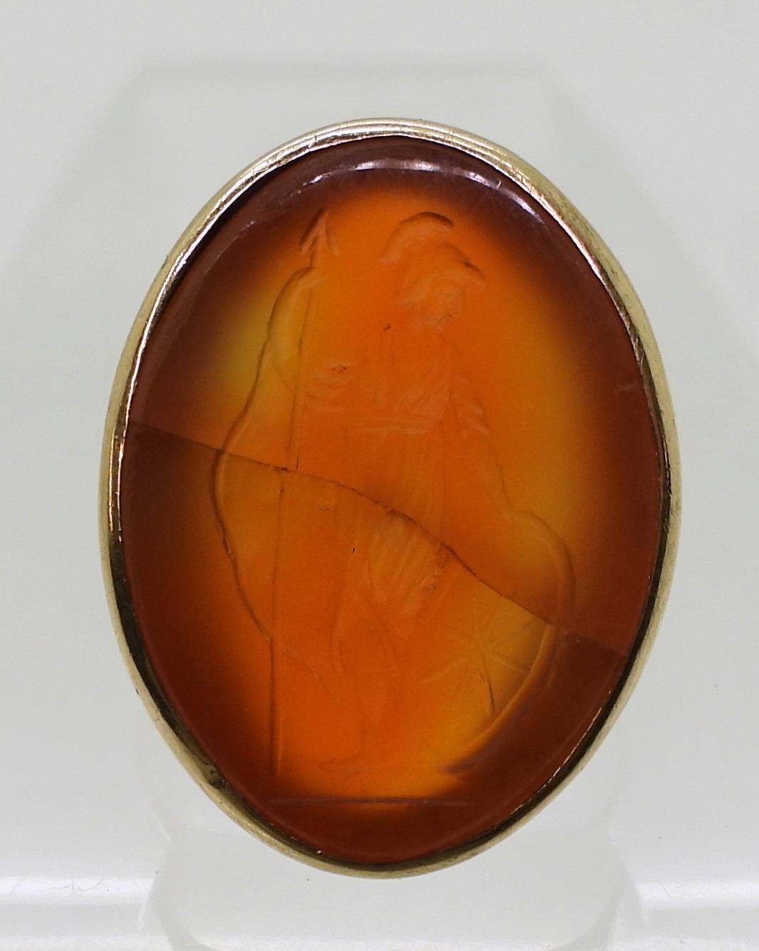 A bright yellow metal signet ring set with a large carnelian intaglio carved with Brittania ( - Image 2 of 6