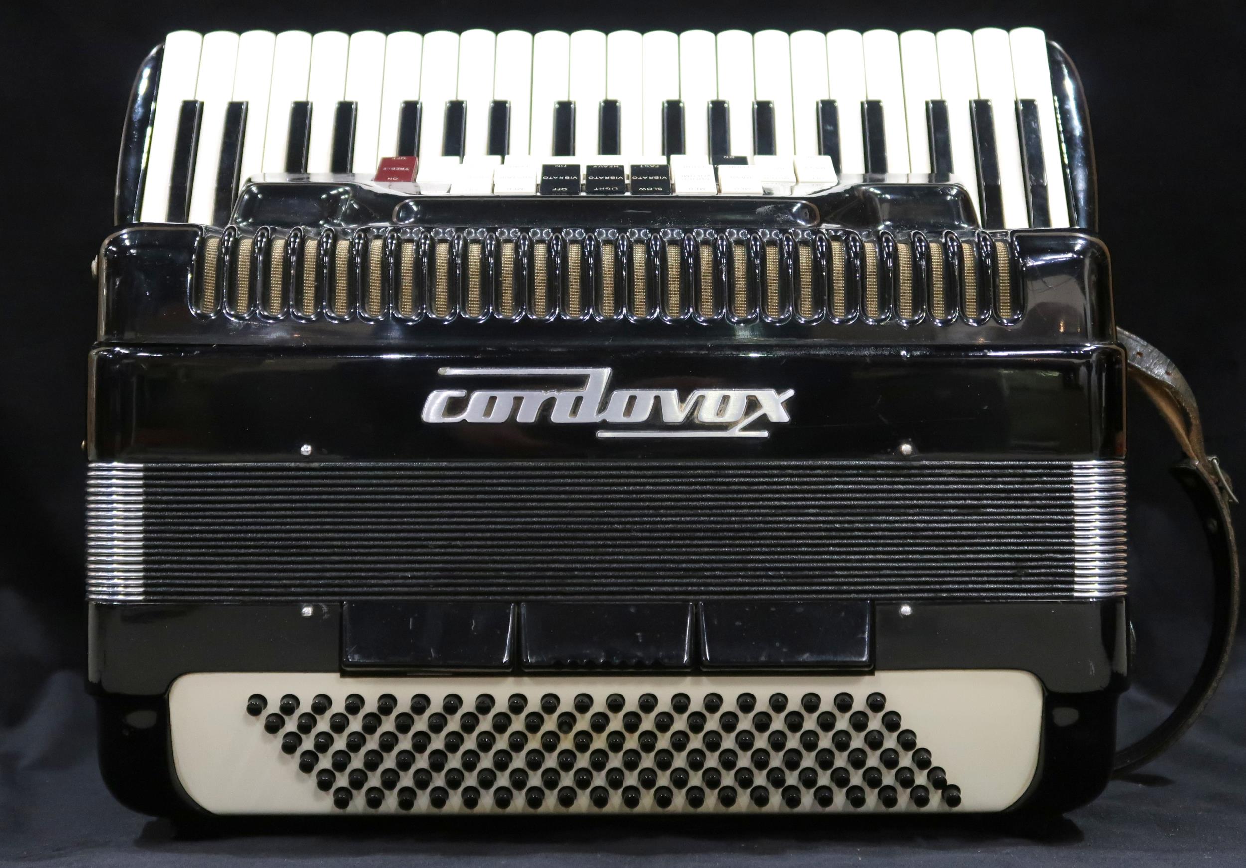 CORDOVOX a Cordovox 120 bass 41 key piano accordion with case  In 1962, a Farfisa technical team led