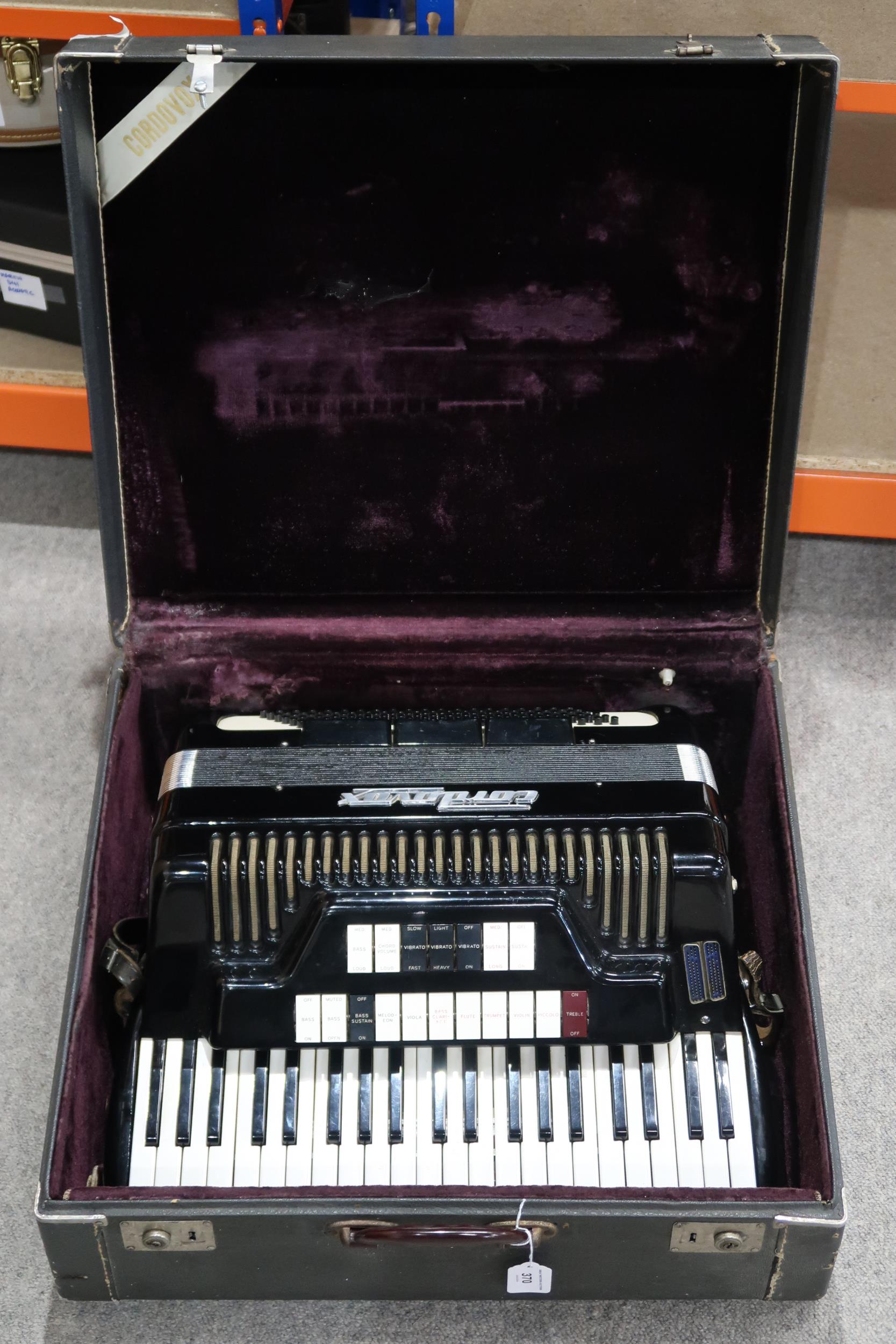 CORDOVOX a Cordovox 120 bass 41 key piano accordion with case  In 1962, a Farfisa technical team led - Image 9 of 9