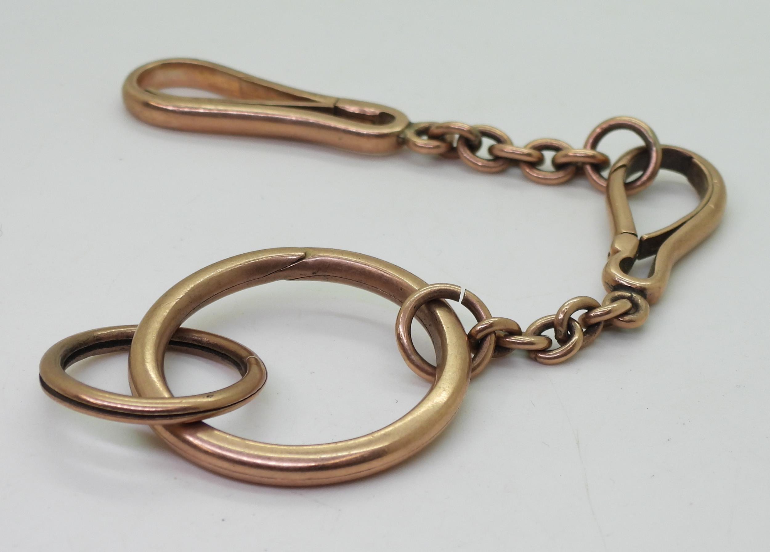 A Chinese rose coloured metal fob chain, with Chinese marks, further stamped 40%? weight 44.3gms - Image 2 of 2
