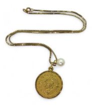 A 14k gold Mikimoto pearl pendant, a 14k gold Mayan calendar pendant, weight 4.5gms, and a 40cm