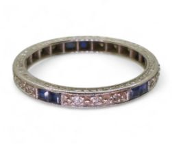 An 18ct white gold sapphire and diamond eternity ring size Q1/2, weight 2.8gms Condition Report: