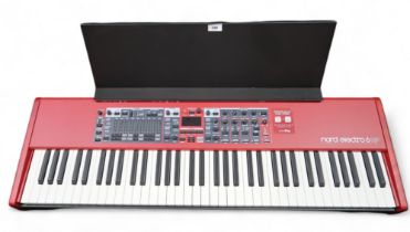 Nord Electro 6 HP  73 note hammer action portable keyboard together with stand and stool. This