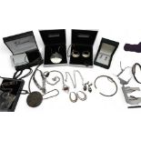 A large silver locket, a pendant and earring set by Tianguis Jackson, silver items inlaid with