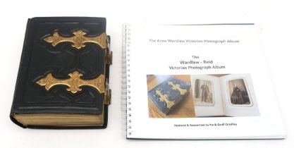 A Victorian leatherbound photograph album containing portraits of the family of Ralph Wardlaw.