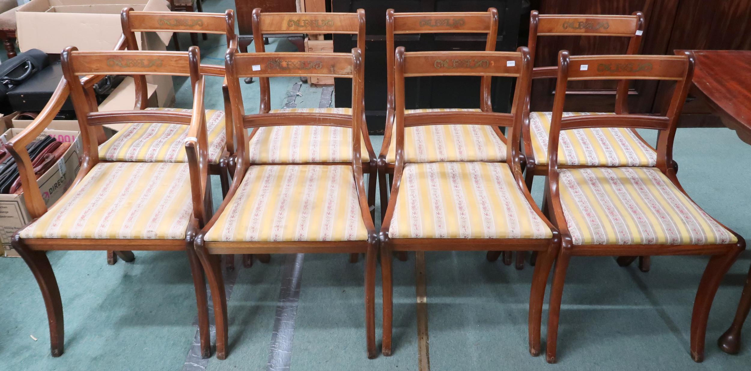 A set of eight 20th century reproduction sabre legged dining chairs (8) Condition Report:Available