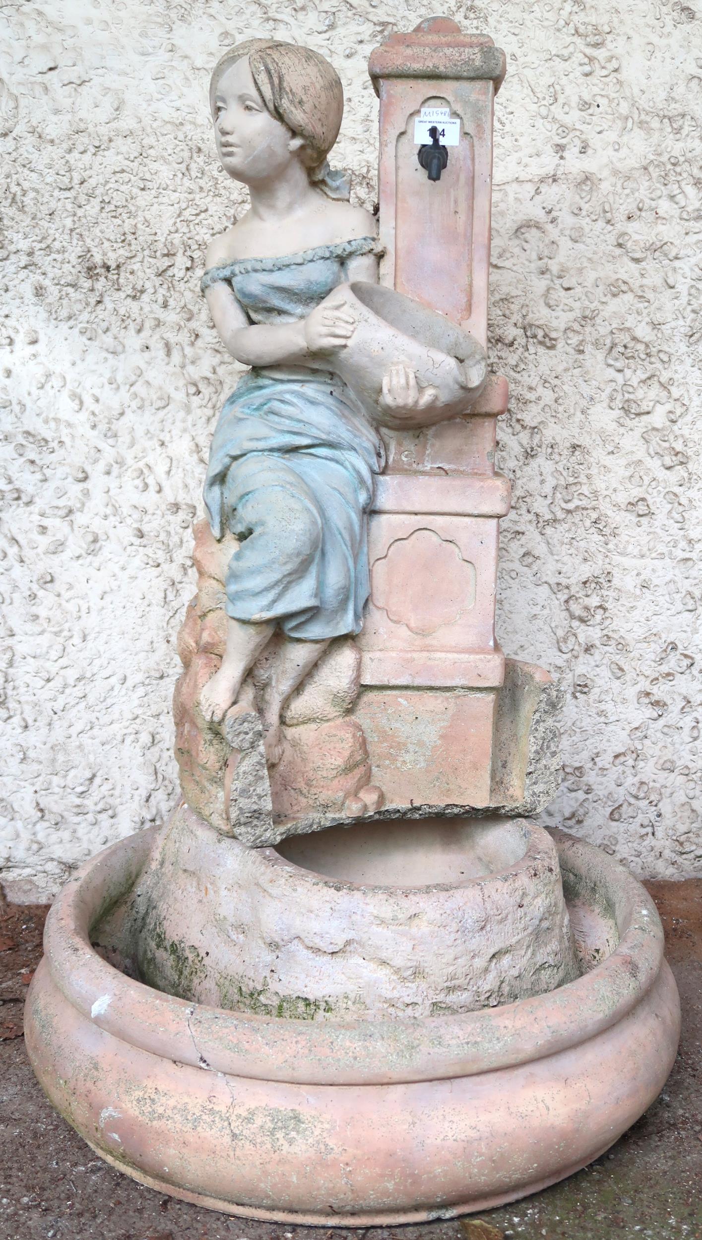 A contemporary reconstituted stone figural garden water feature depicting maiden filling an urn,