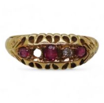An 18ct red gem & diamond ring, hallmarked Birmingham 1919, finger size O1/2, weight 3.1gms