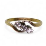 An 18ct and platinum three stone diamond ring set with estimated approx 0.25cts of eight cut