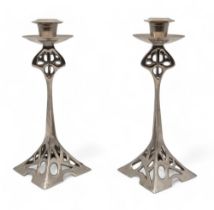 A pair of Arts and Crafts style candlesticks Condition Report:Available upon request