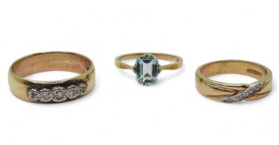 Two 9ct gold diamond set band rings, sizes O1/2, W1/2 and a 9ct blue gem ring, size N1/2, weight