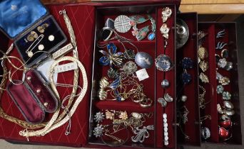 A red velvet jewellery box full of vintage costume to include, vintage gold plated studs in boxes,