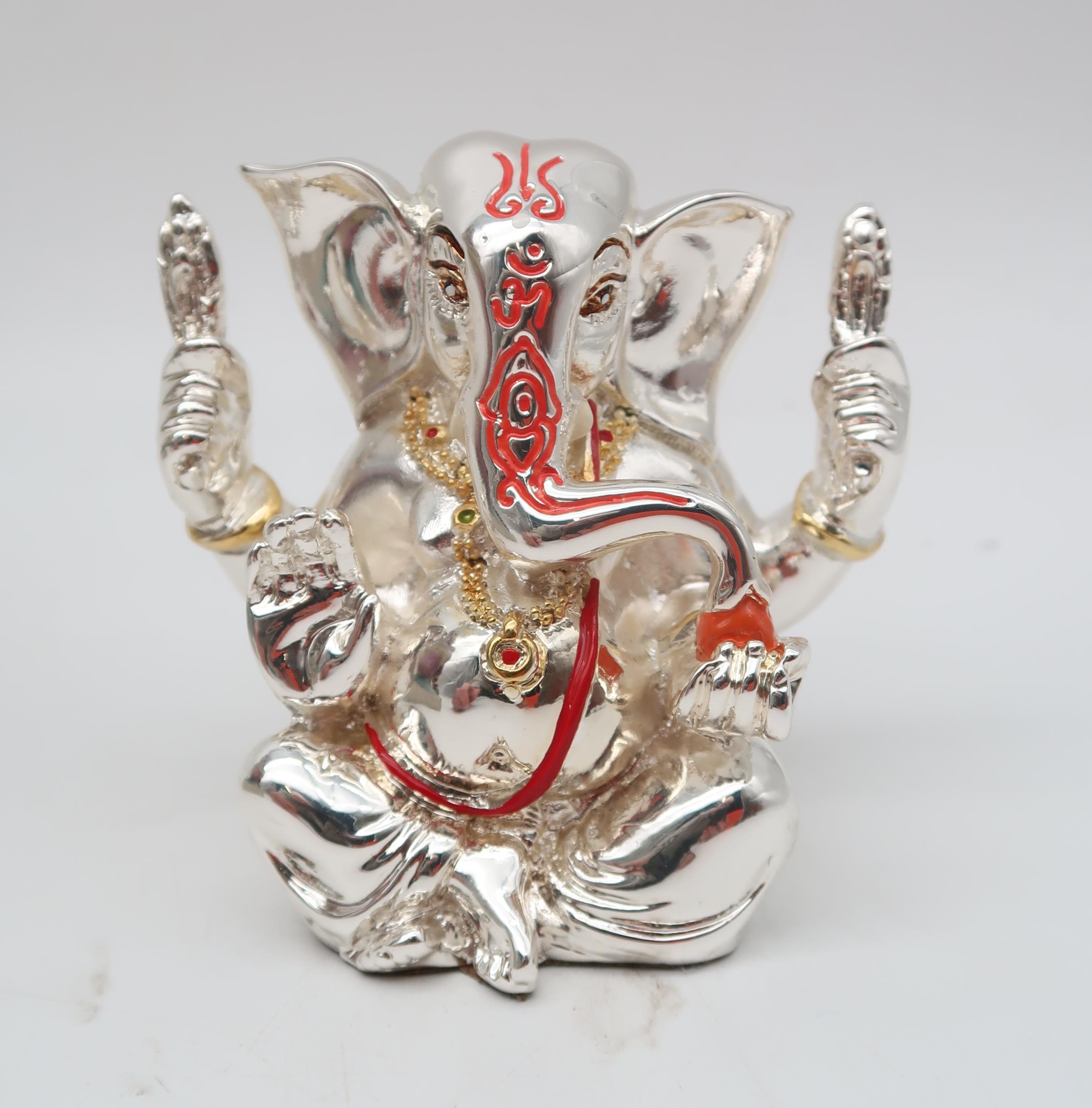 A painted alabaster model of Ganesh, 32cm high, and a silver coated example by Lorodana Sandona, 9cm - Image 2 of 3