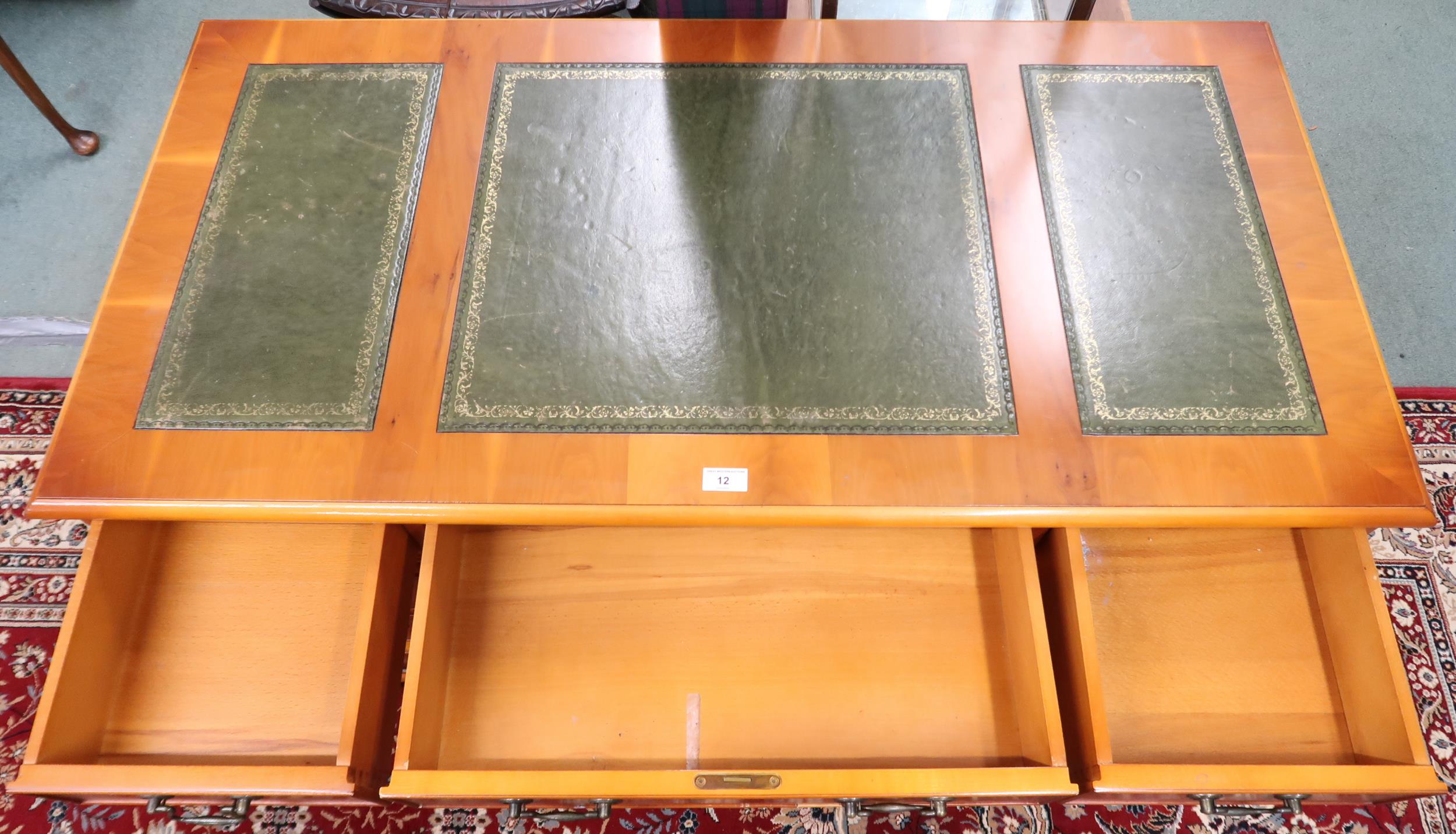 A 20th century pedestal desk with green leather skiver over central drawer flanked by four drawer - Image 2 of 2