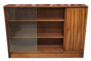 A mid 20th century teak Herbert Gibb bookcase with pair of glass sliding doors alongside cabinet
