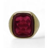 A 9ct gold red glass gem set signet ring, size U approx, weight 9.6gms Condition Report:Available