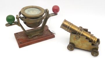 A small brass ship's binnacle compass by Bergen Nautik of Norway, together with a heavy brass desk