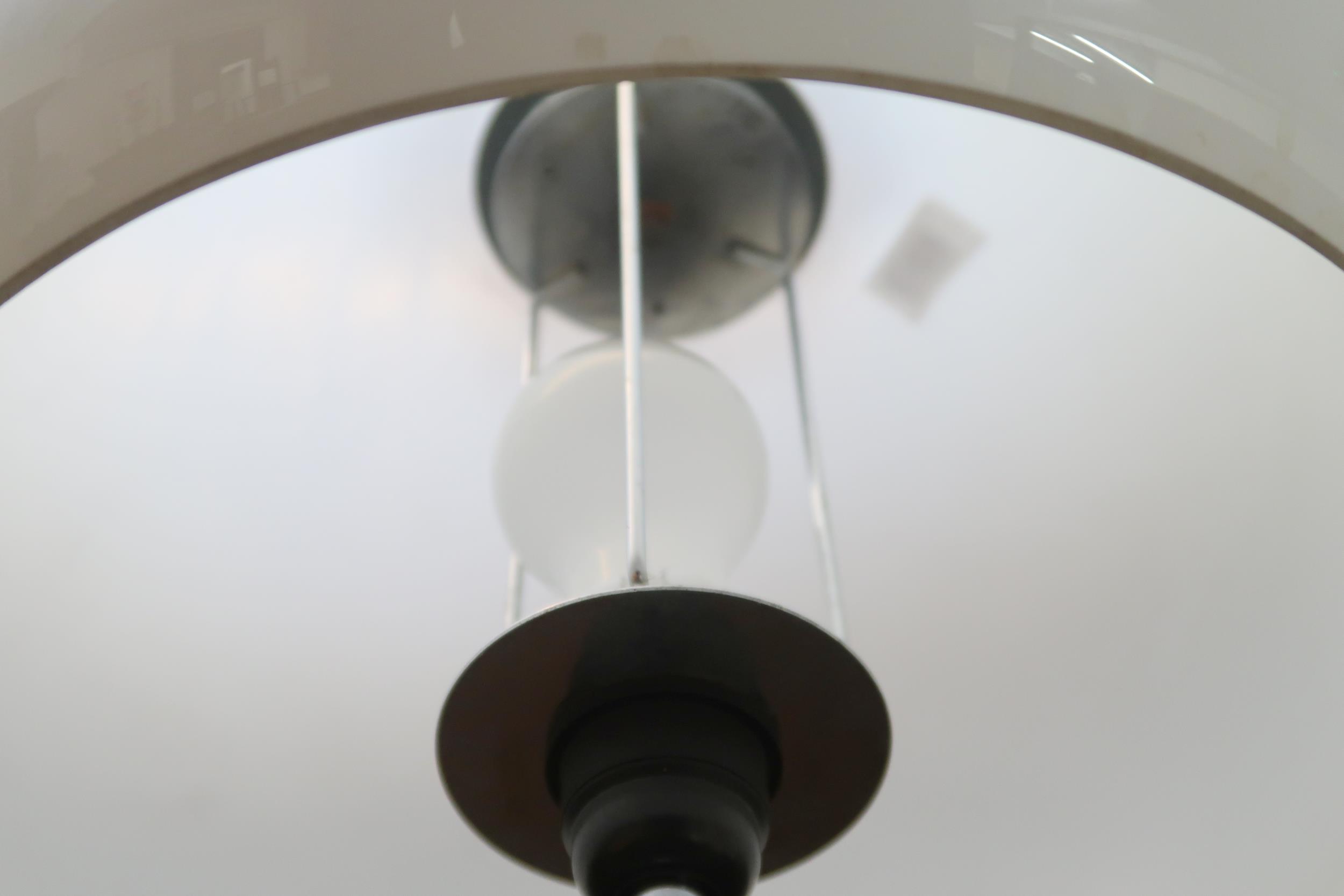 A 20th century after Guzzini standard lamp with domed acrylic shade on chromed upright with circular - Image 3 of 3