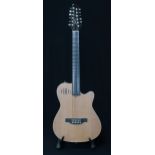 A Godin A12 electro acoustic 12 string guitar serial number 20154152 with a Godin gig bag. This