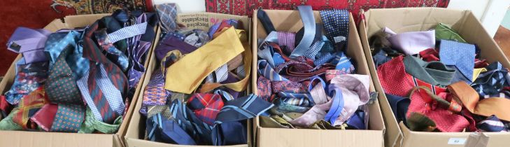 A lot of four boxes of assorted gents neck ties to include silk and knit examples (4) Condition