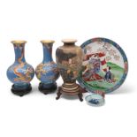 A pair of Chinese cloisonne vases, decorated with dragons chasing flaming pearls, 25cm high, a