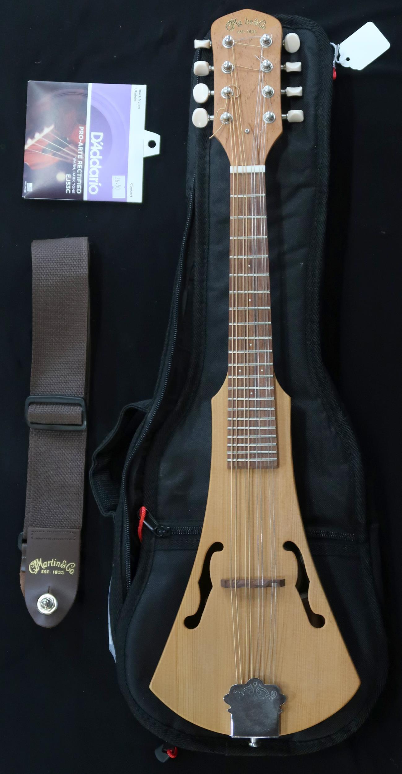 A CF Martin & Co backpacker mandolin serial number 170366 with a soft case and strap Condition