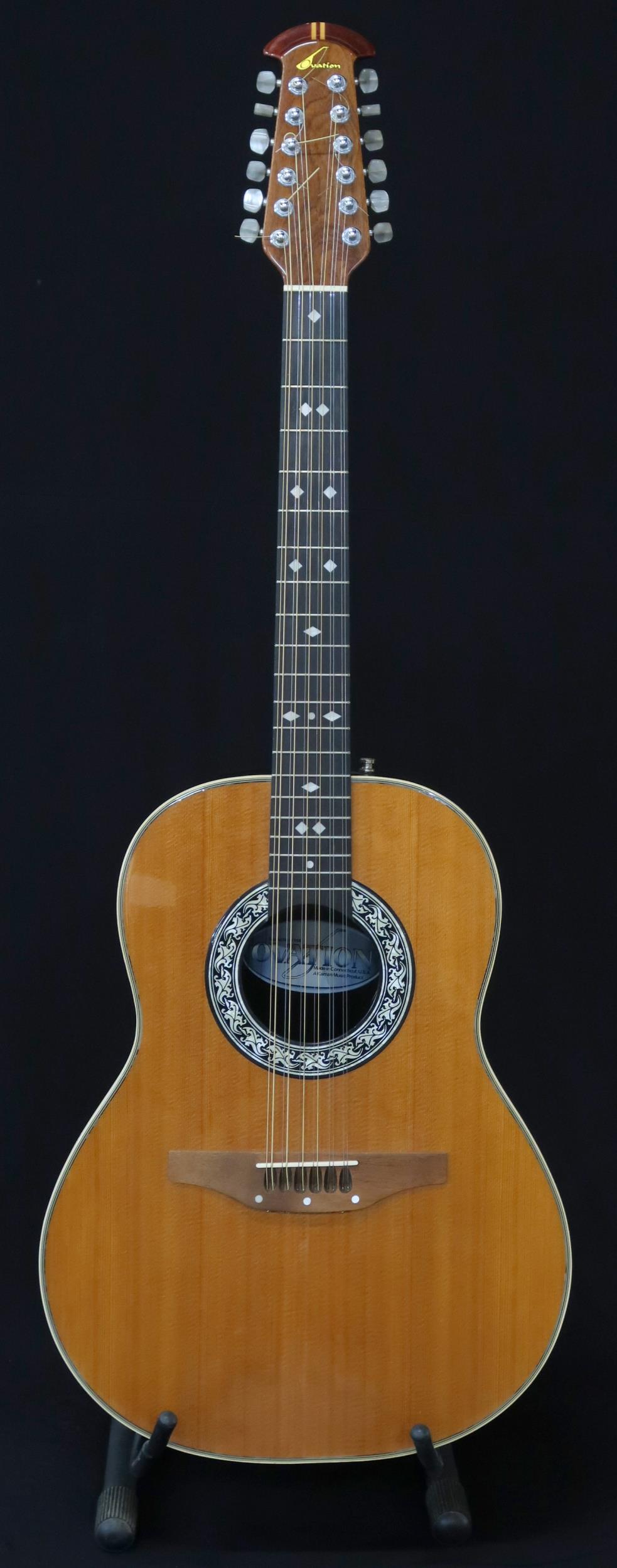 An Ovation 12 string acoustic guitar, model 1155, serial number 307217 this 20 fret guitar comes