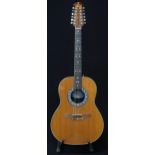 An Ovation 12 string acoustic guitar, model 1155, serial number 307217 this 20 fret guitar comes