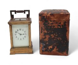 A brass and glass repeating carriage clock Condition Report:Available upon request