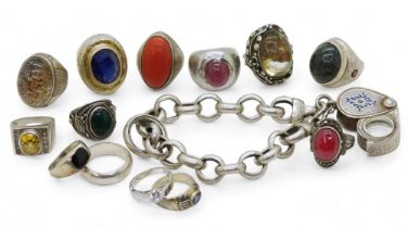 A collection of silver and white metal rings, to include treated sapphire, quartz and a white