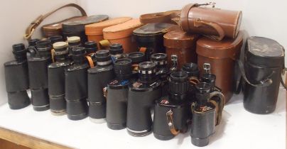 A quantity of cased vintage binoculars, with manufacturers to include Fujica, Swift, Pulse,