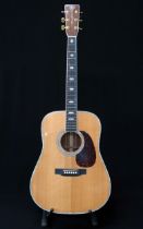 A Martin D-41 dreadnought 6 string acoustic guitar serial number 1012136 made in 2004 with a