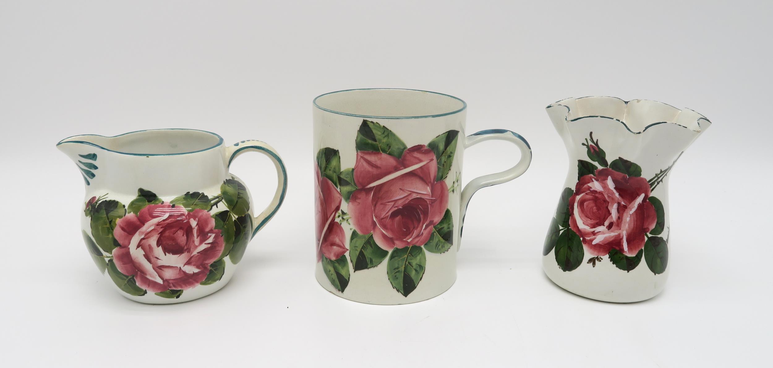 A collection of Wemyss ware all painted with cabbage roses including a tankard 14cm high, a wavy rim - Image 2 of 5