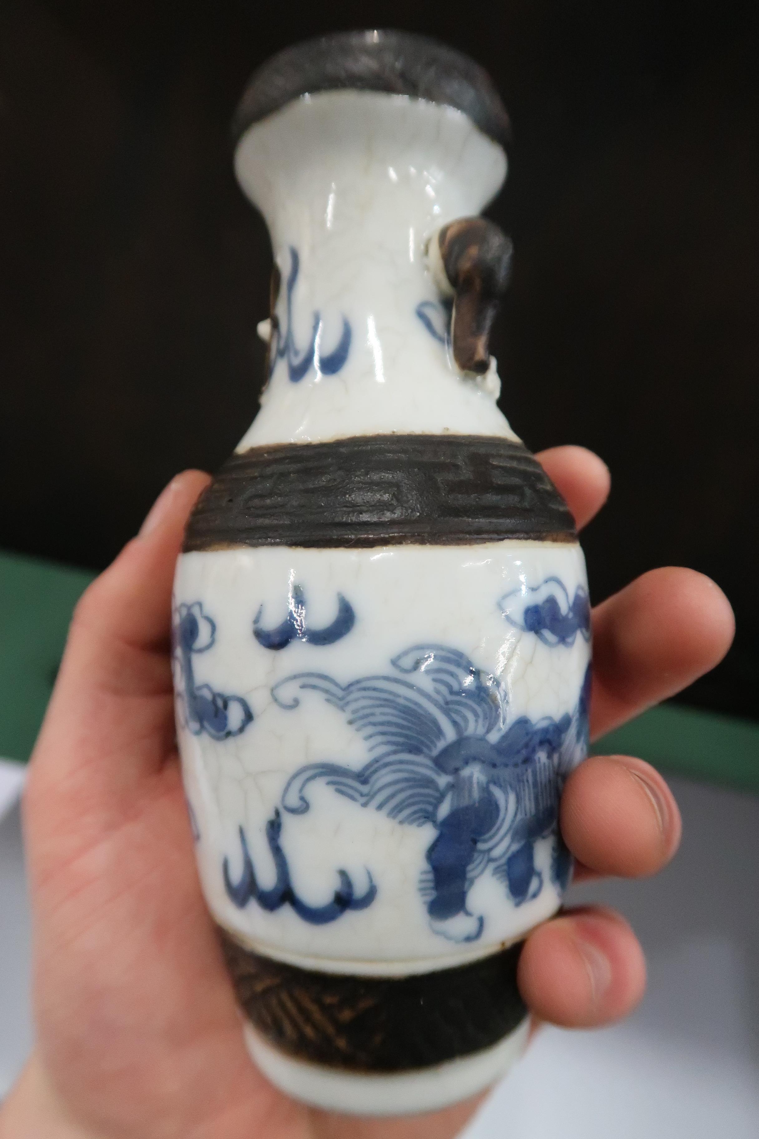 A Nanking 'Warriors' ginger jar, 22cm, a smaller example, 13cm, two Japanese blue and white - Image 29 of 31