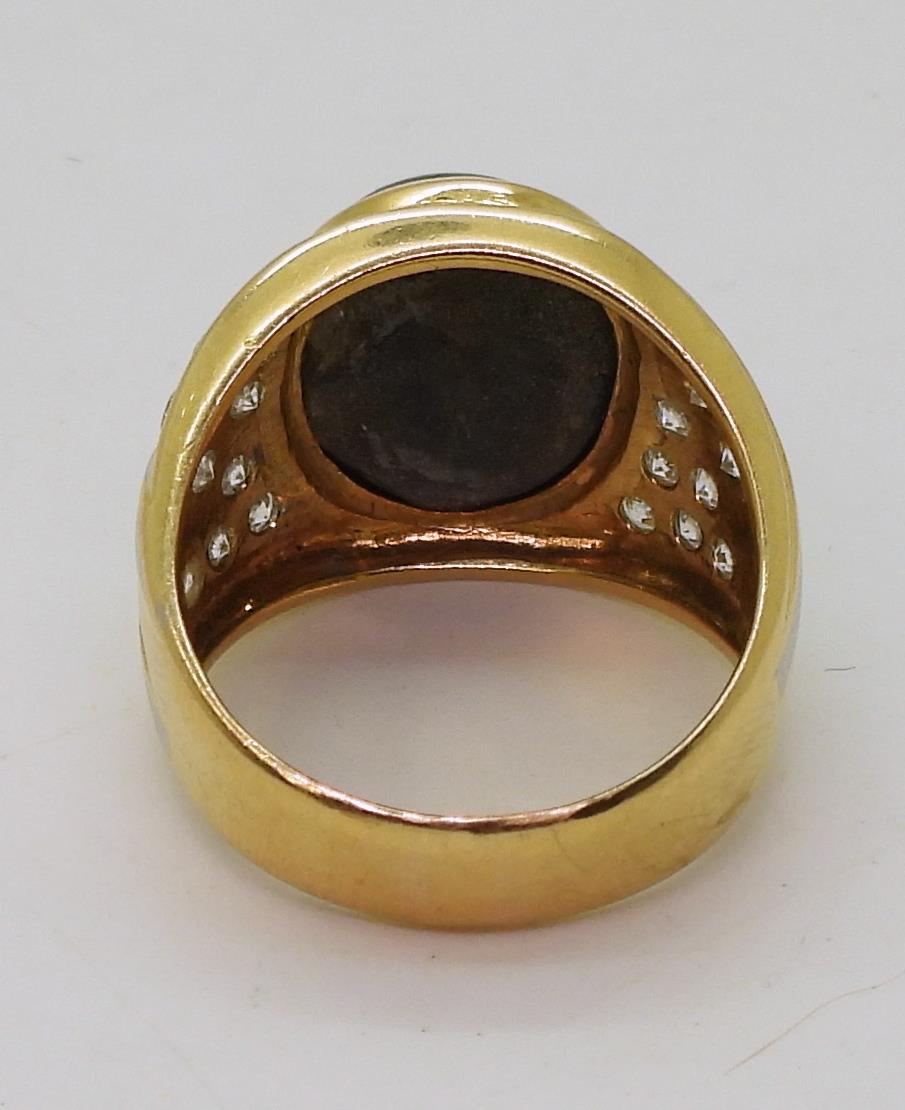 A yellow metal ring set with a star sapphire and clear gems, size S, weight 13.7gms Condition - Image 5 of 7