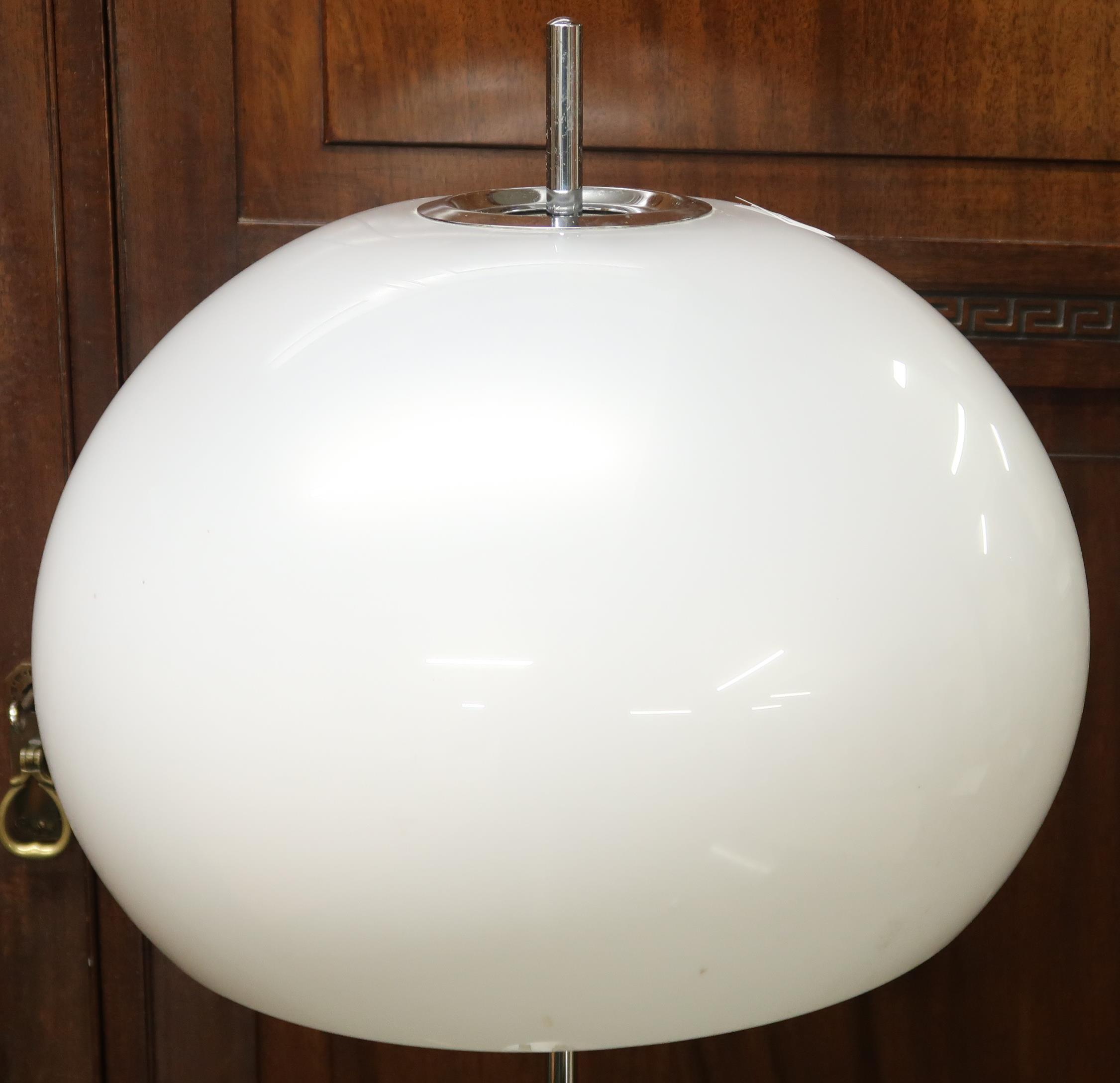 A 20th century after Guzzini standard lamp with domed acrylic shade on chromed upright with circular - Image 2 of 3