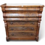 A Victorian mahogany and walnut veneered Ogee chest of drawers with two long ogee frieze drawers