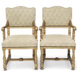 A pair of early 20th century gilt framed theatre seats with beige geometric upholstery, scrolled