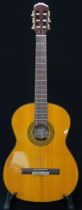 A Takamine G Series six string classical acoustic guitar model number G128S 19 fret , nylon strung