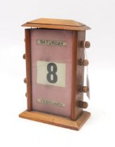 An early-20th century perpetual desk calendar, measuring approx. 21cm in height Condition Report: