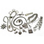 A collection of silver and white metal to include curb chain bracelets and a necklace, gate