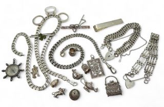 A collection of silver and white metal to include curb chain bracelets and a necklace, gate