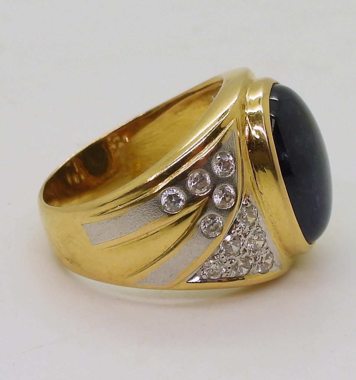 A yellow metal ring set with a star sapphire and clear gems, size S, weight 13.7gms Condition - Image 4 of 7