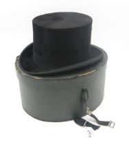 A boxed German silk top hat by A. Keudel of Hagen, measuring approx. 19.8cm front-to-back and 16.2cm