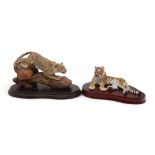 Four Sherratt & Simpson big cat models including Tiger, Lion and cub, Leopard and Snow Leopard