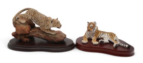 Four Sherratt & Simpson big cat models including Tiger, Lion and cub, Leopard and Snow Leopard